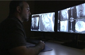 Dr. Jason Hoover examining results